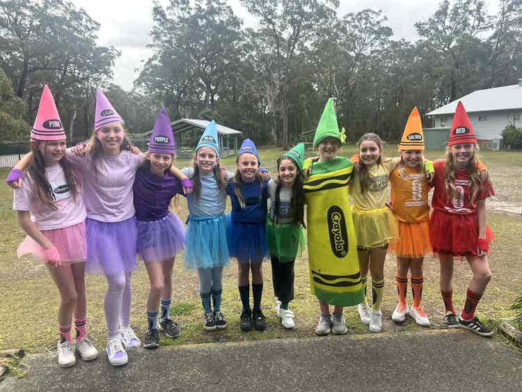 book parade students dressed as crayons